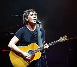 Williams performing with Dragon in 2009