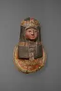 Mummy mask with long wig and broad collar