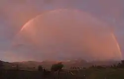 Rainbow over McLeod Peak looking east across Jocko Valley