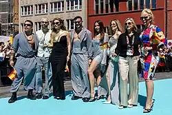 Melody, her dancers, and RTVE managers on the "Turquoise Carpet".