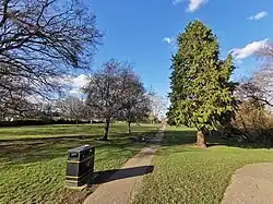 Green area west of the pond, as viewed from the main entrance off Shirley Way