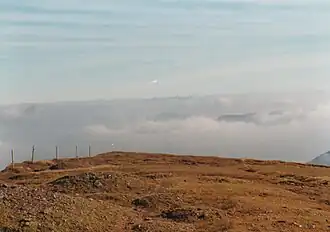 Looking across from Mount Brandon towards Carrauntoohil in the clouds