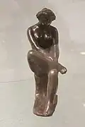 Statuette of a seated woman (1900)