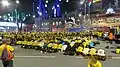 Muslims doing Isha Prayer while Chinese watching silently during Bersih 4