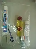 Travel toiletries in a reclosable plastic bag