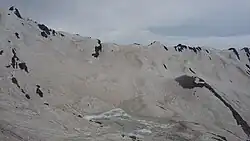 Picture of a lake at a mountain.
