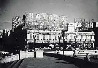 Neon signs at Calle Belascoain seen from Antonio Maceo Park