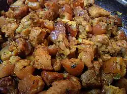 Pork curry, a stir-fried, often spicy curry from Nepal