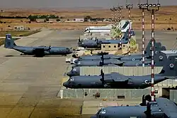 C-130J (gray), C-130H (beige) and Boeing 707 tankers (white) near the southern Nevatim runway in 2017