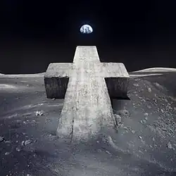 Single cover art for "New Lands" depicting Justice's concrete cross on a lunar surface