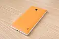 Back of an orange Nokia Lumia 930