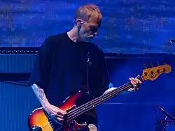 Bell performing with Oasis in July 2025