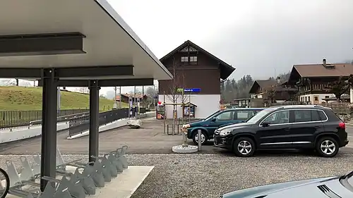 Three-story station building with gabled roof