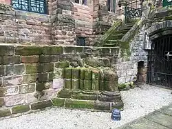 Priory remains in the foundation of the building