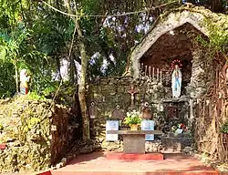 The small part of the ruin walls of the Old Oton Church what’s left today which was made into a charming and seemingly enchanting grotto located beside the new church.