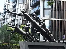 The sculpture in 2015, with One Hyde Park in the background