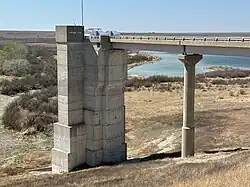 Intake tower with service bridge at Optima Lake Dam, April 2024