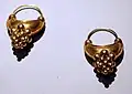 Castellani golds, made in imitation of the ancient in part by incorporating original materials, 19th century, ship earrings with bunches