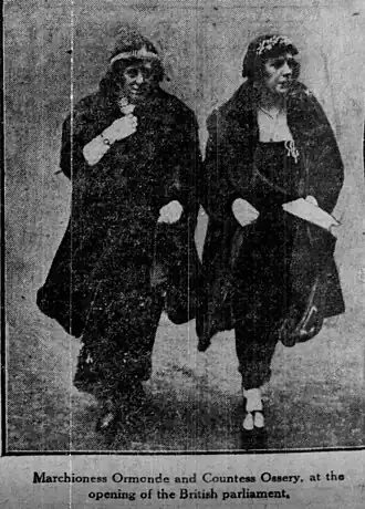 Lady Ormonde and her daughter-in-law Lady Ossory walking together wearing tiaras in December 1922