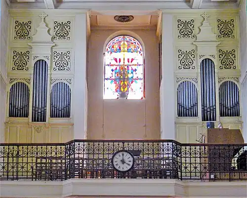The organ in the tribune ;