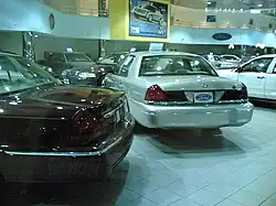 A 2006 Ford Crown Victoria Standard in a Ford/Mercury dealership in Kuwait