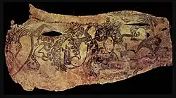 Tattoos of the chief's right arm, with zoomorphic symbols.[237]