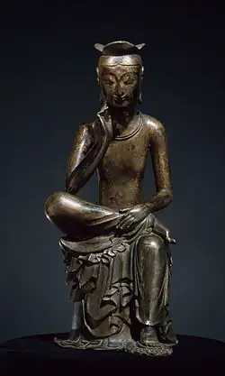 Pensive Bodhisattva Maitreya, Silla, late 6th or early 7th century. Gilt bronze, h. 93.5&nbsp;cm. National Treasure no. 83. National Museum of Korea.