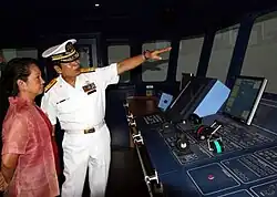 President Gloria Macapagal Arroyo listens to MAAP president in her visit to the academy.