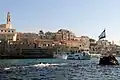 The rock, with Jaffa's port in the background