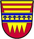 726 Maintenance Battalion, USA: Gules (Crimson), in chief on a pile of four points or, two barrulets of the first, overall on a fess of the second, six fleurs-de-lis azure between two barrulets of the same.