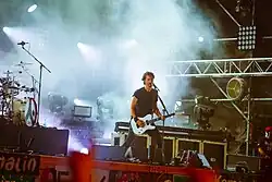 Joe Duplantier playing a guitar in 2018