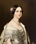 Painted head and shoulders portrait of a young woman wearing an ermine stole thrown over one shoulder, a double strand of large pearls around her neck, pearl drop earrings, and a pink camellia arranged in the hair over her right ear