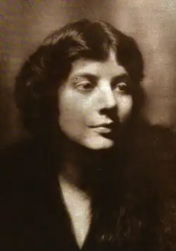 A young white woman, in sepia tones