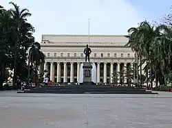 Liwasang Bonifacio and the Manila Central Post Office. The centre of the plaza is dominated by a bronze statue of Andrés Bonifacio.