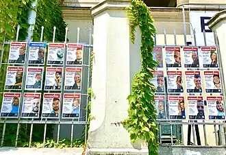 Posters of hostages on the gates of the synagogue