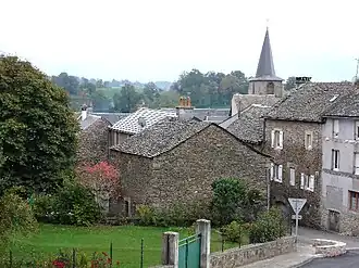 The church and surrounding buildings in Prades-Salars