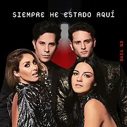 The band members appear in front of the camera, covering most of the original logo. Christian is on the top left, with Christopher next to him. Maite appears in front of Christopher but in a sitting position, with Anahí by her side, in front of Christian in the same manner.