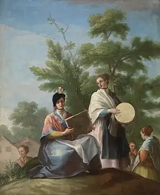 Girls playing the tambourine