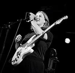 Marie Amdam (vocals and guitar)