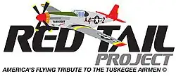 Logo of the Red Tail Project with the words: "RED TAIL" in black letters above the left-aligned word PROJECT in gray letters which are half as tall all of which is above a motto reading: "AMERICA's FLYING TRIBUTE TO THE TUSKEGEE AIRMEN" (c), written in all caps, in a single line the same width as the first and much smaller letters. A single nosed-propeller aircraft with a red tail and nose, black propellers, gray base paint, black letters reading A42. The "4" and "2" are separated by a United States roundel in black with a central white star. The roundel is also visible on the tops of the aircraft's wings.