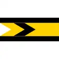 A sign with two horizontal black bars with a yellow and black arrow pointing right in the centre