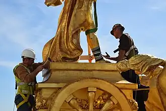 Removal of male charioteer