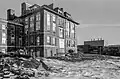 The west side of Roberts Hall stands exposed after Stone's demolition. ca 1988.