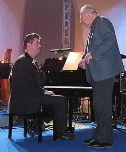 Jure Robežnik (right) on his 70th birthday with pianist Blaž Jurjevčič (left)