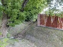 Old Jeziorki Ditch in Warsaw's Dąbrówka, near Karmazynowa Street, view from the southeast, joining a smaller local ditch