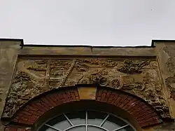 bas-relief image of a car race, Tsar Nicholas II Car Garages, Pushkin, Saint Petersburg