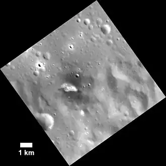 Hollow on the southern rim with halo of low reflectance material