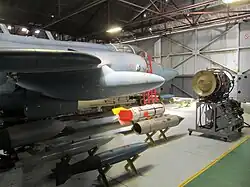 SAAF Blackburn Buccaneer on static display with munition loadout and its Blue Parrot radar system.