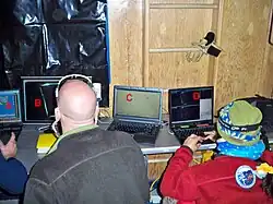 Figure 4A: SCINI control room with four display screens for ROV control (A), main camera view (B), SBL navigation display (C) and image annotation or science screen (D)