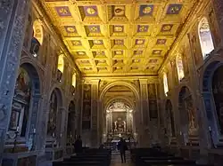The nave, with Florentine lilies in the coffered ceiling